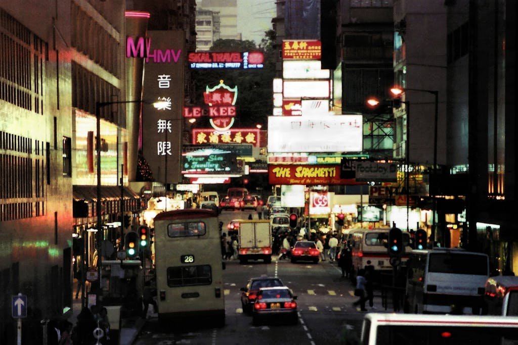 A vibrant, bustling scene of nighttime activity in Hong Kong's busy Hankow Road.